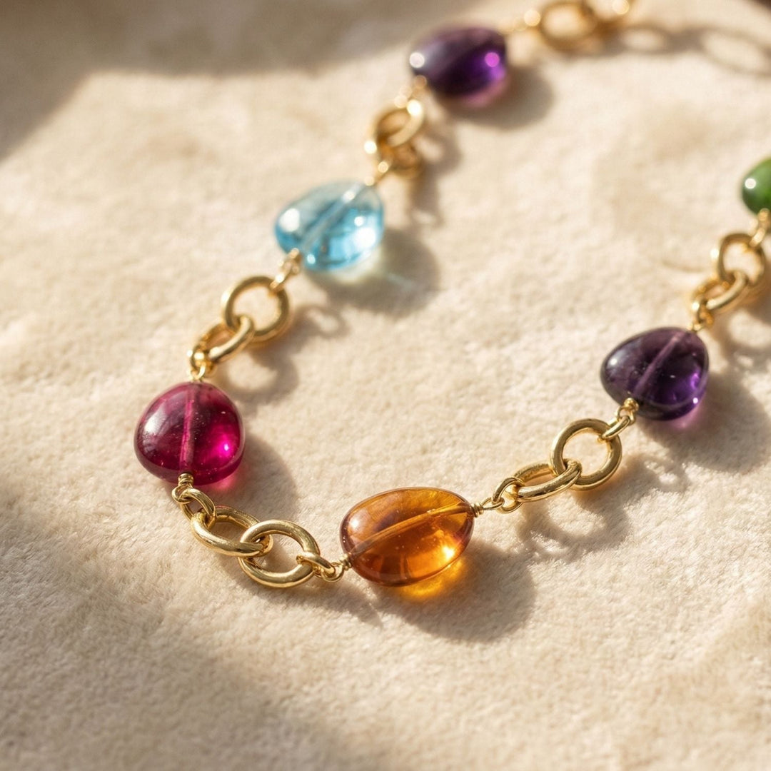 Personalised birthstone charm necklace in gold, a meaningful jewellery gift